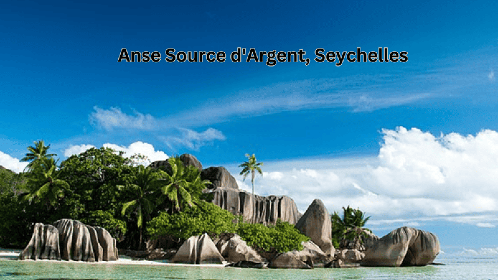 Anse Source d'Argent in Seychelles, featuring pink sand, granite boulders, and lush vegetation.