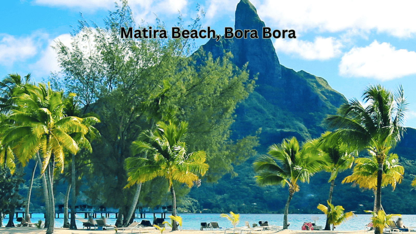 Matira Beach in Bora Bora, featuring white sand and clear blue waters.
