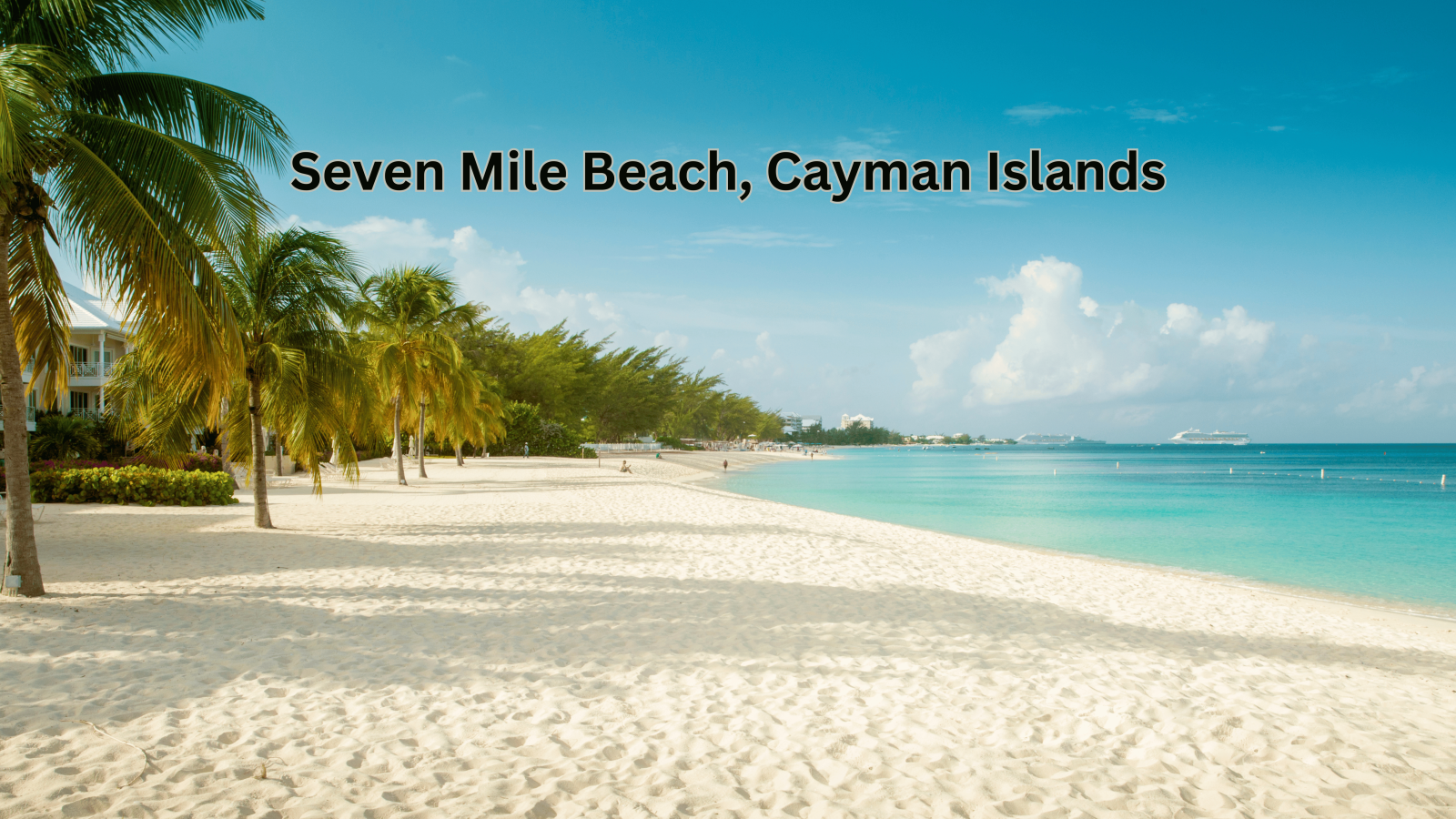 Seven Mile Beach in the Cayman Islands, featuring a long stretch of white sand and clear waters.